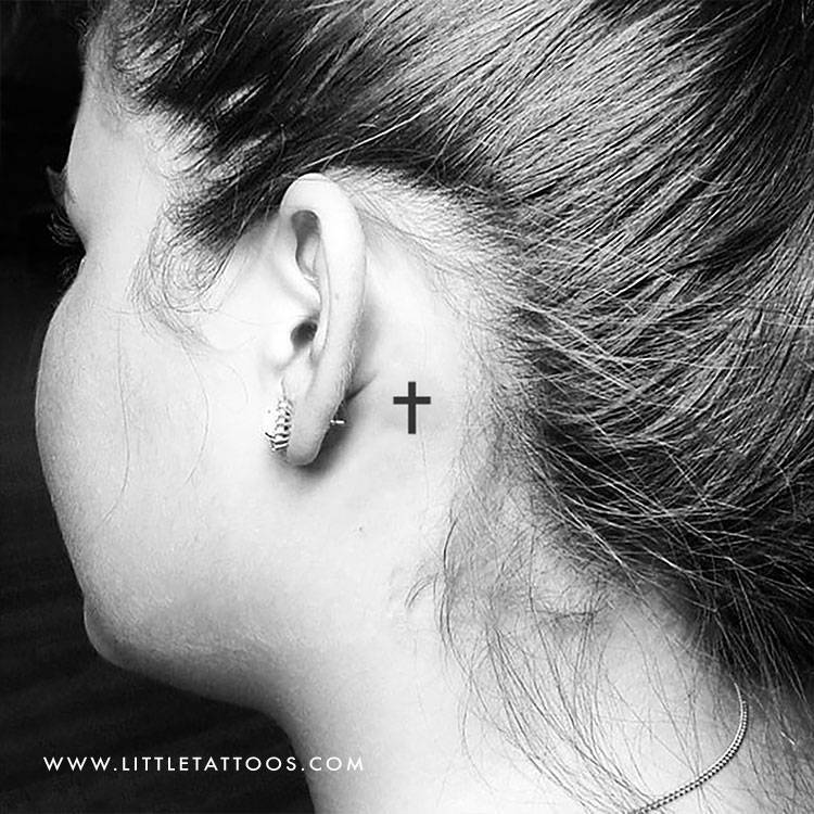 small cross face tattoo 0095