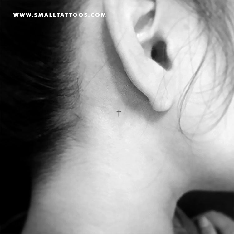 small cross face tattoo 0098