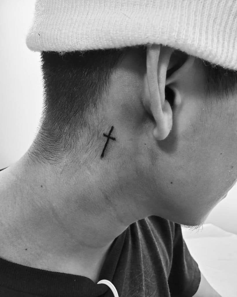 small cross face tattoo 0099