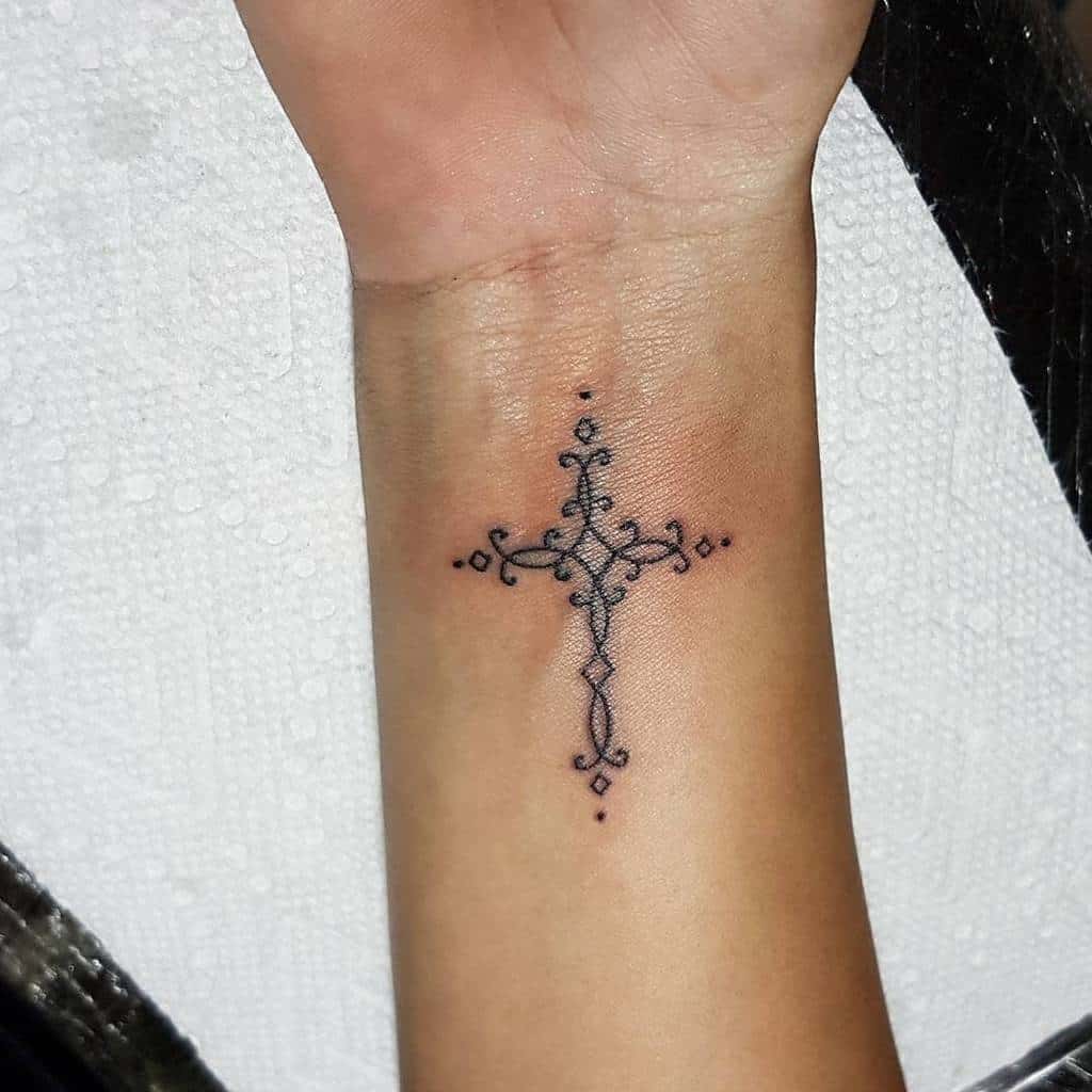 Small cross tattoo 0010