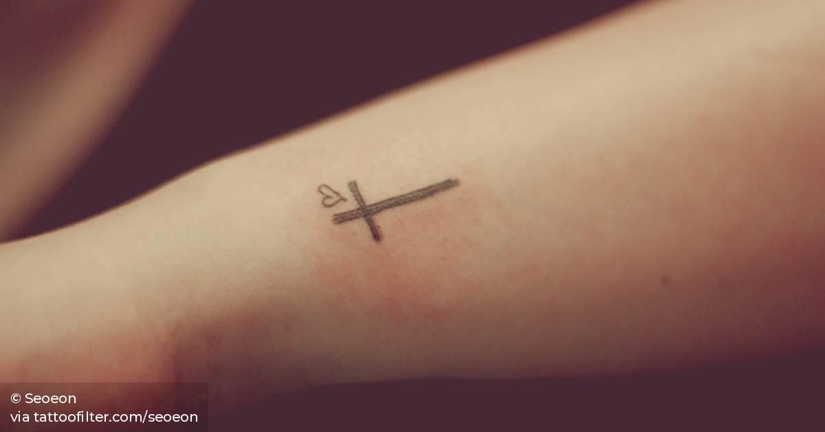 Small cross tattoo 0011