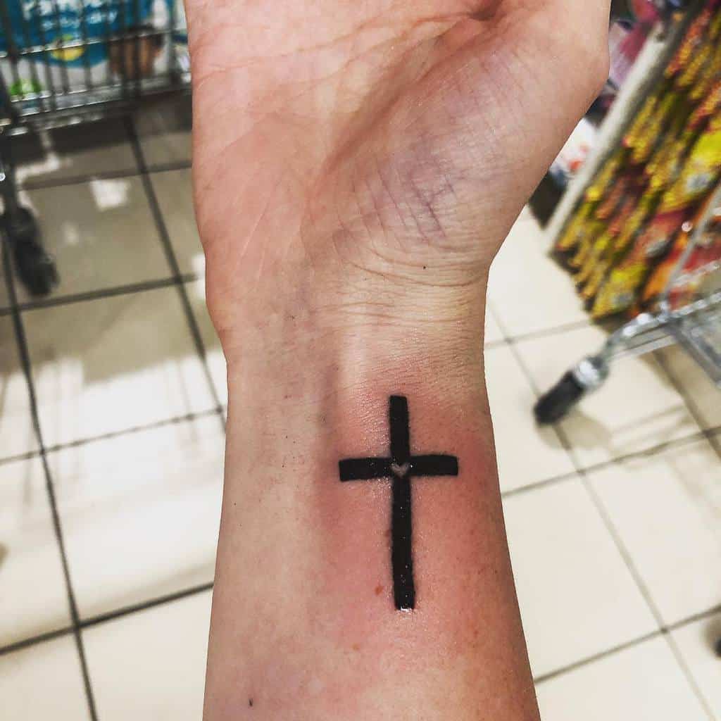 Small cross tattoo 0013