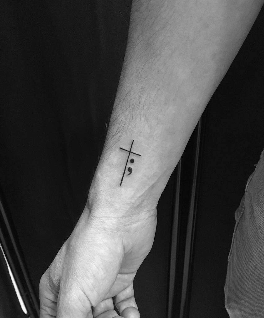 Small cross tattoo 0016