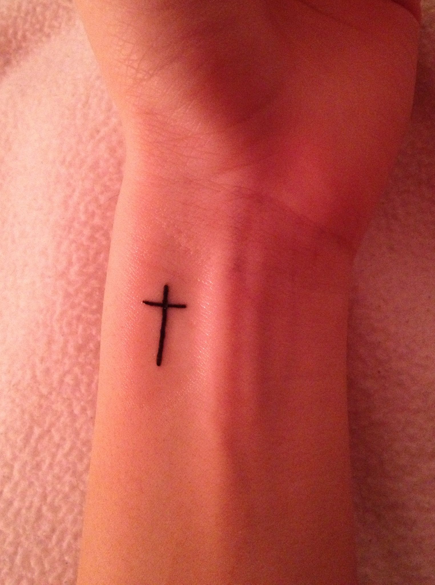 Small cross tattoo 0021