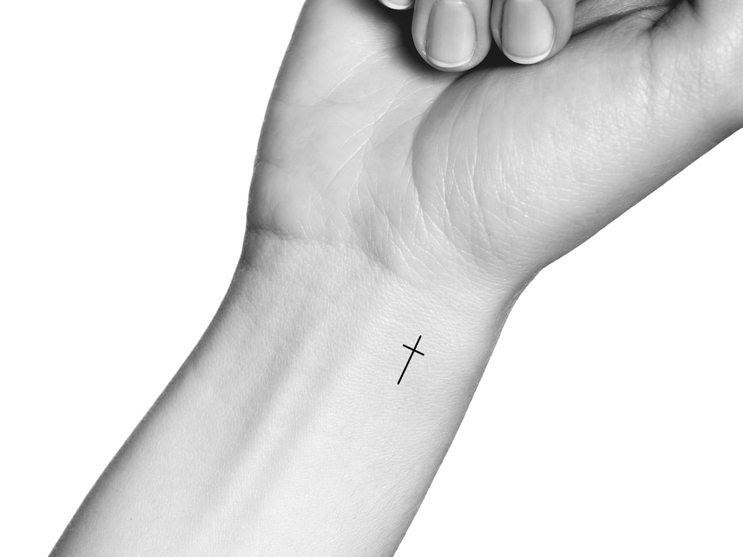 Small cross tattoo 0023