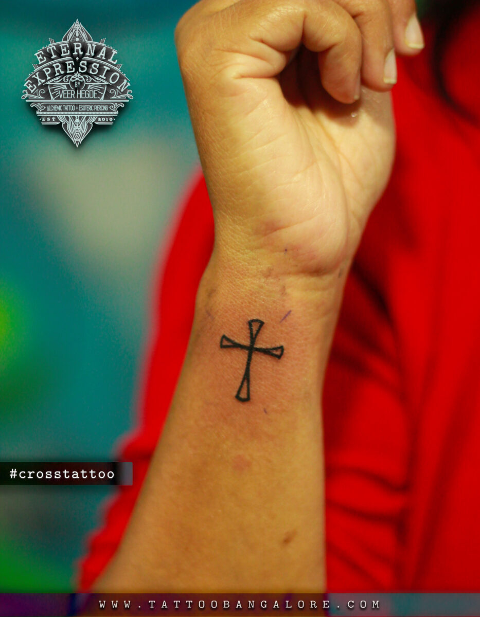 Small cross tattoo 0029