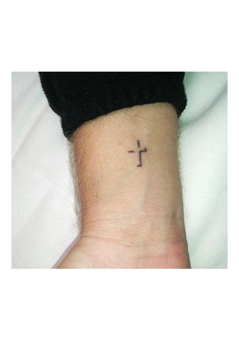 Small cross tattoo 0030