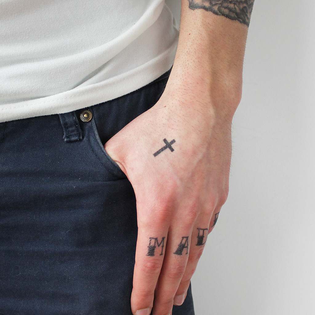 Small cross tattoo 0032