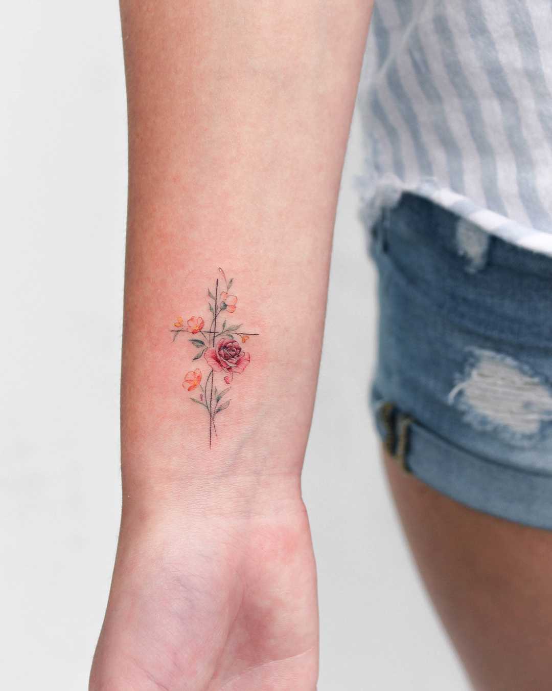 Small cross tattoo 0033