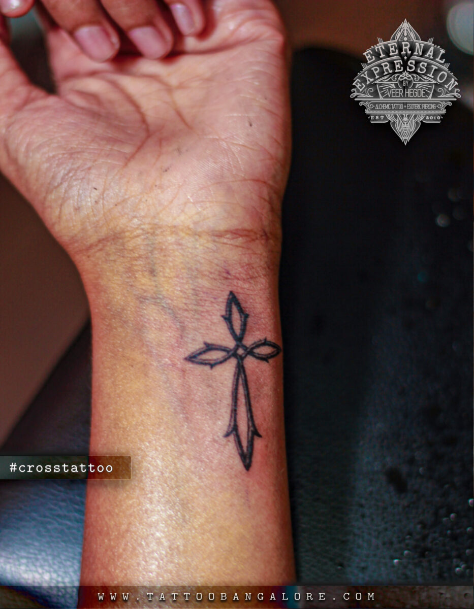 Small cross tattoo 0036