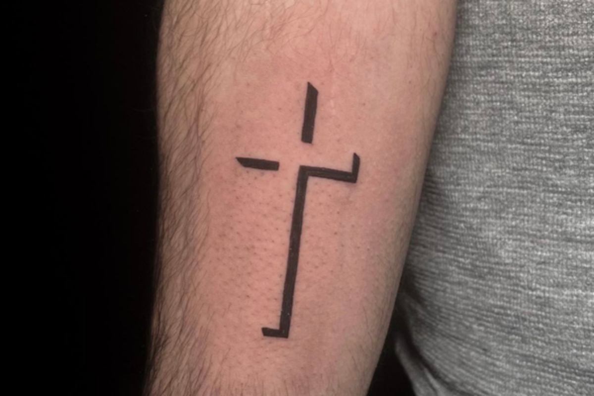 Small cross tattoo 0039