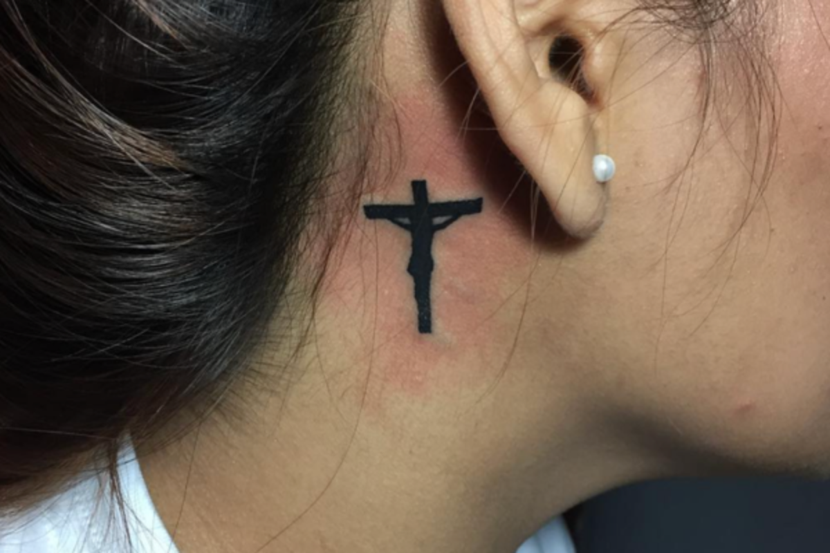 Small cross tattoo 0042