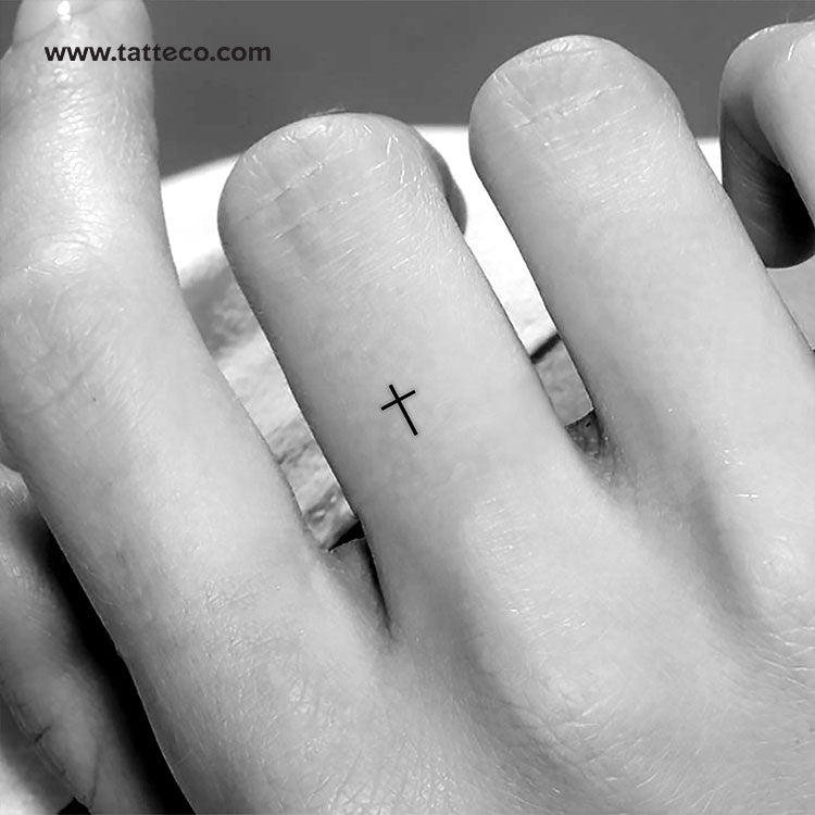 Small cross tattoo 0048