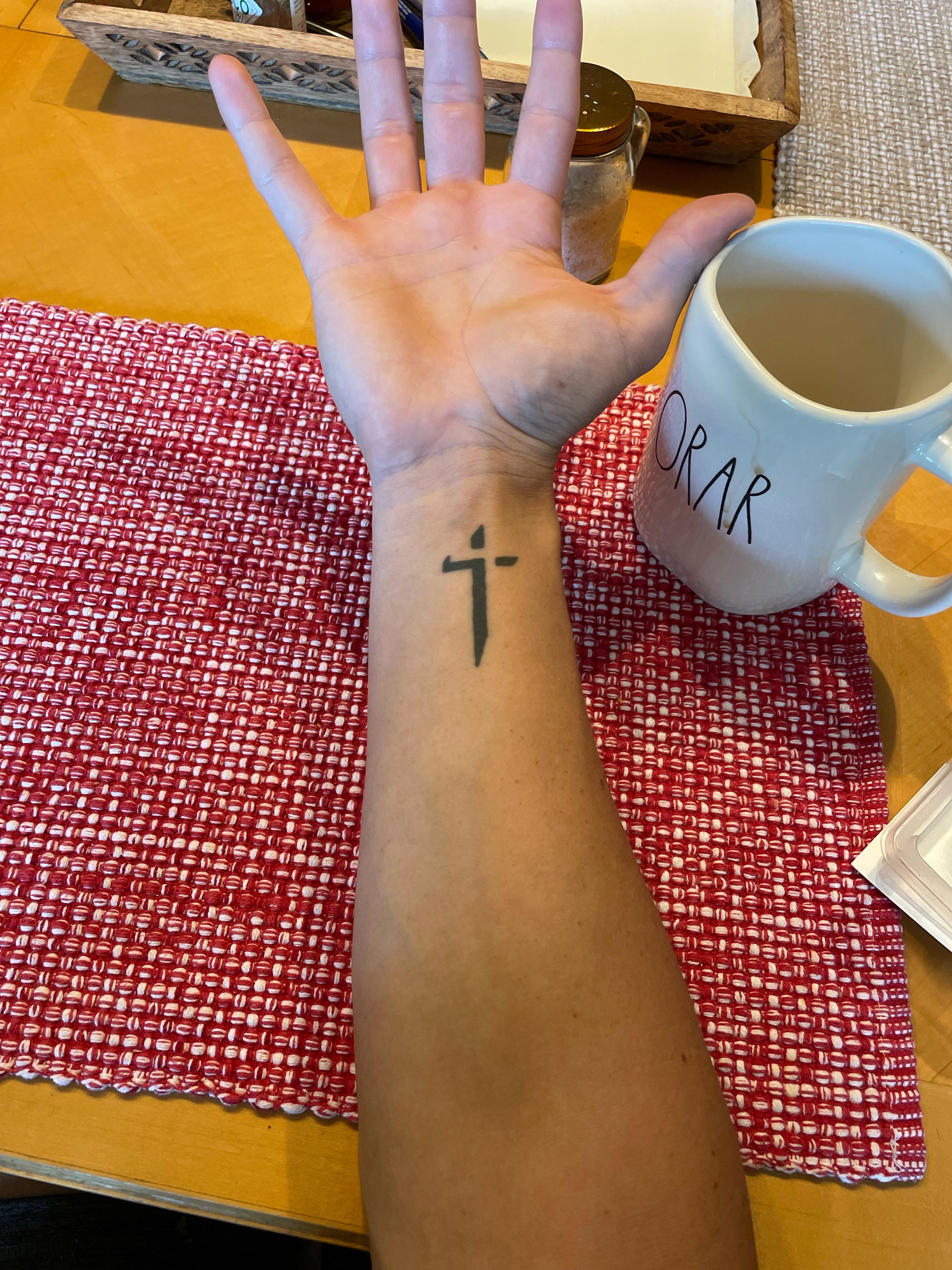 Small cross tattoo 0052