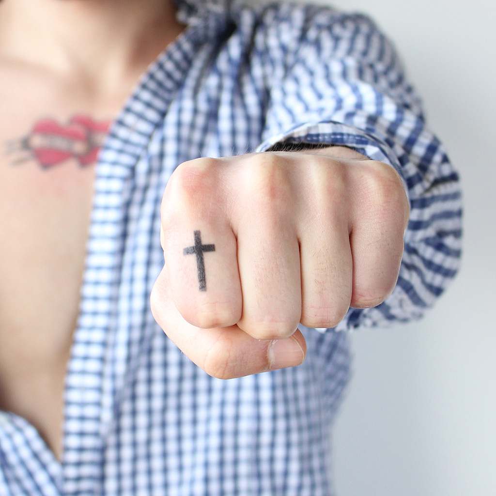 Small cross tattoo 0057