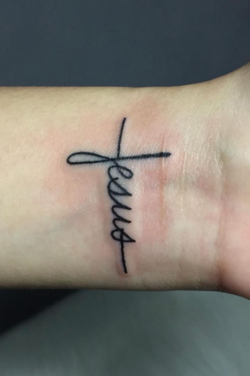 Small cross tattoo 0058