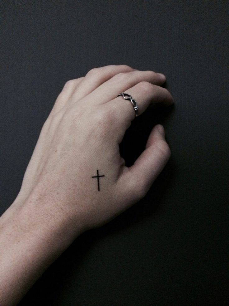 Small cross tattoo 0060