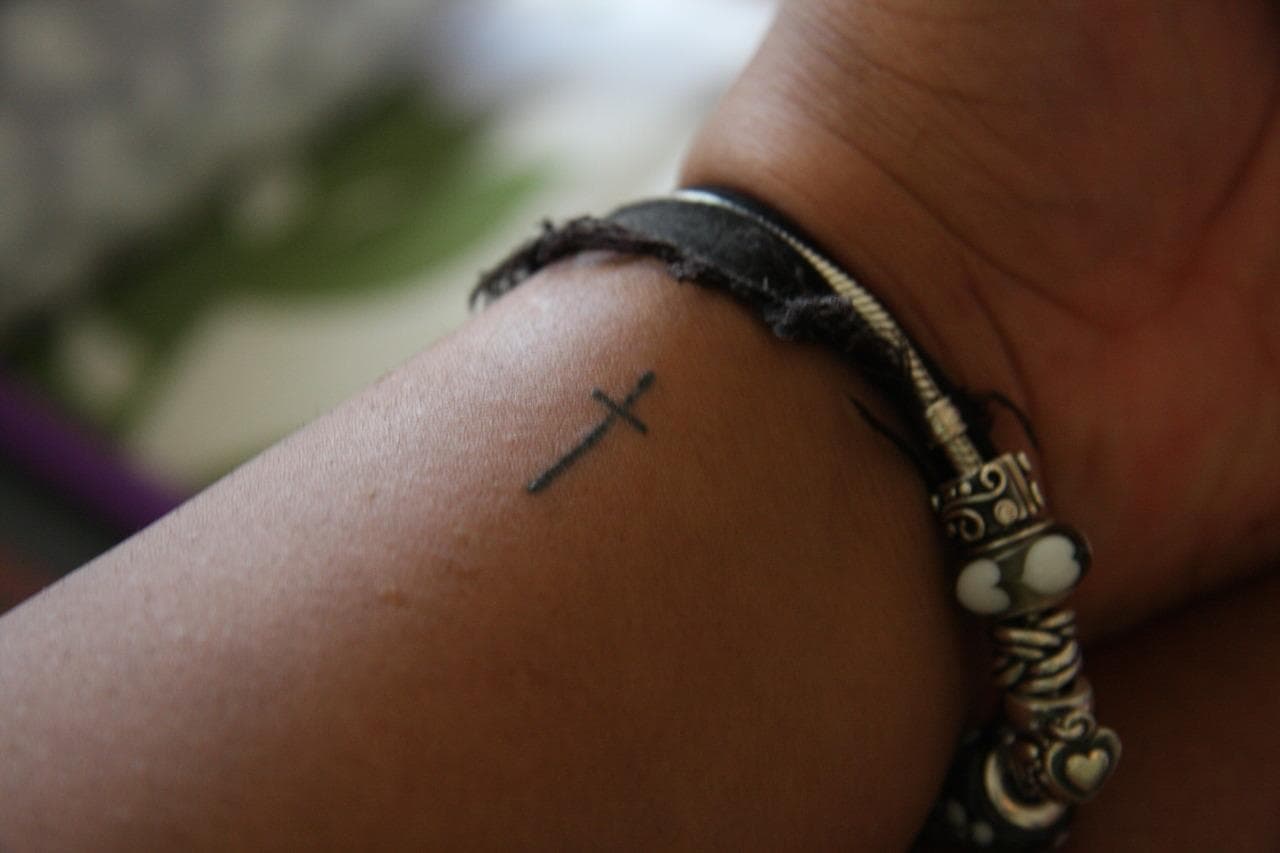 Small cross tattoo 0063