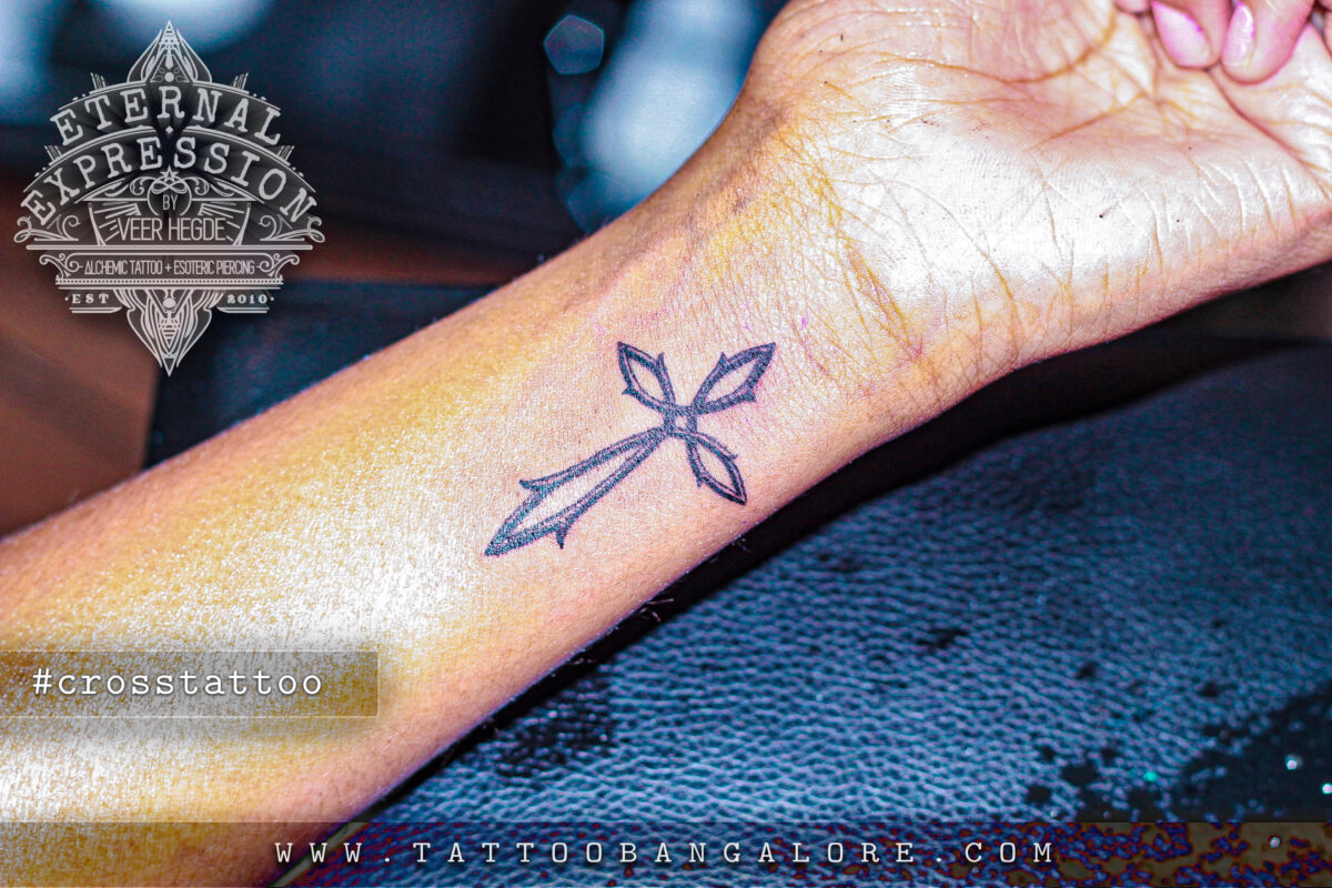 Small cross tattoo 0074