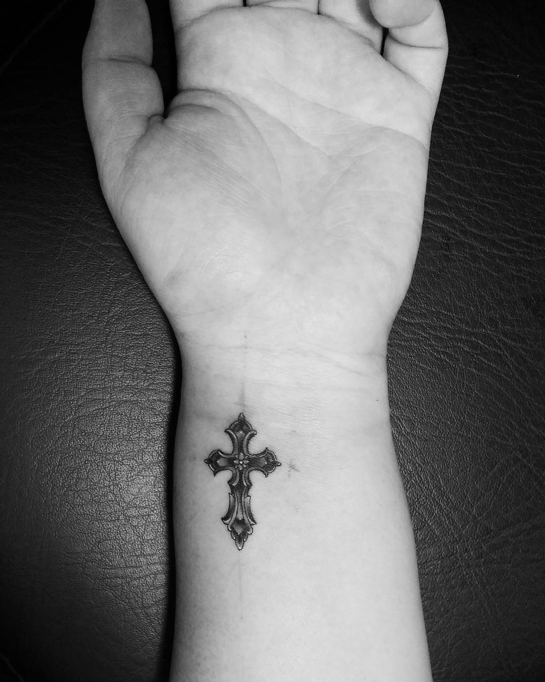 Small cross tattoo 0084