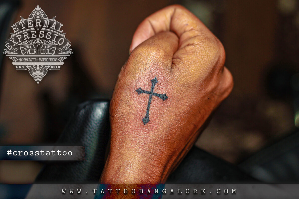 Small cross tattoo 0088