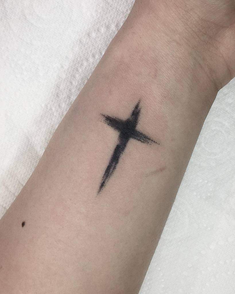 Small cross tattoo 0094