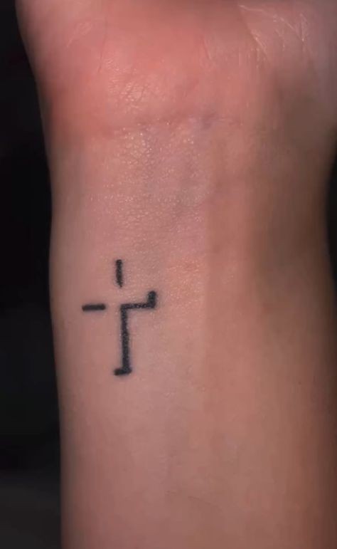 Small cross tattoo 0012