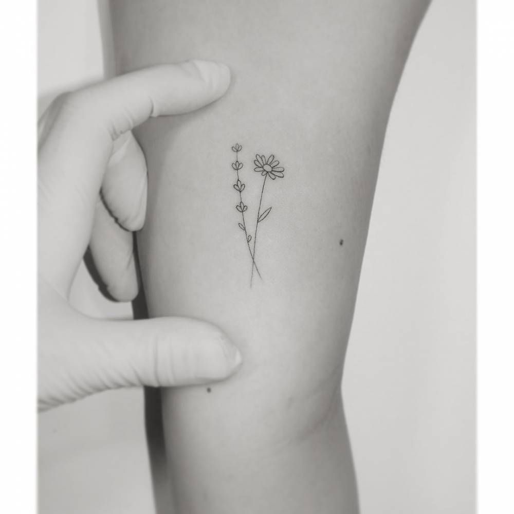 Small daisy tattoo 0012