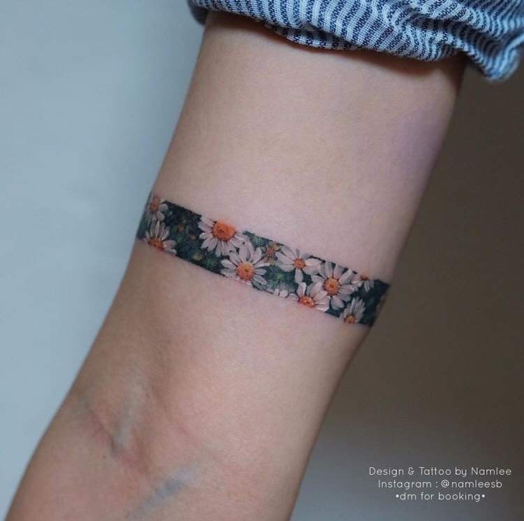 Small daisy tattoo 0066