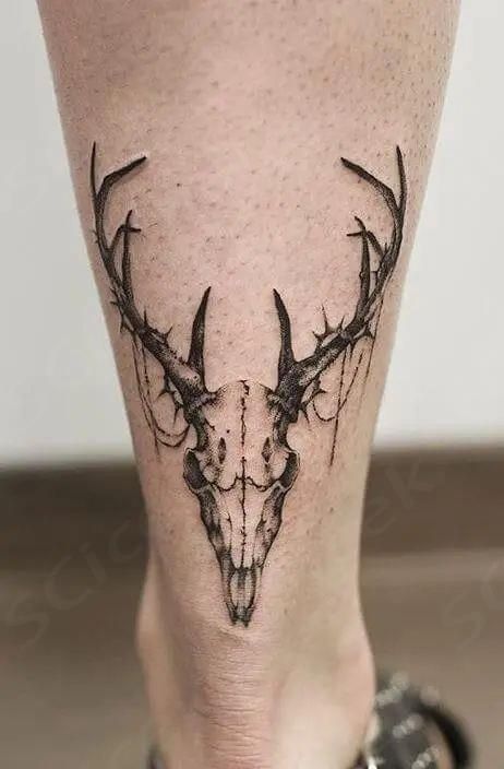 small deer tattoo ideas for discreet placements.