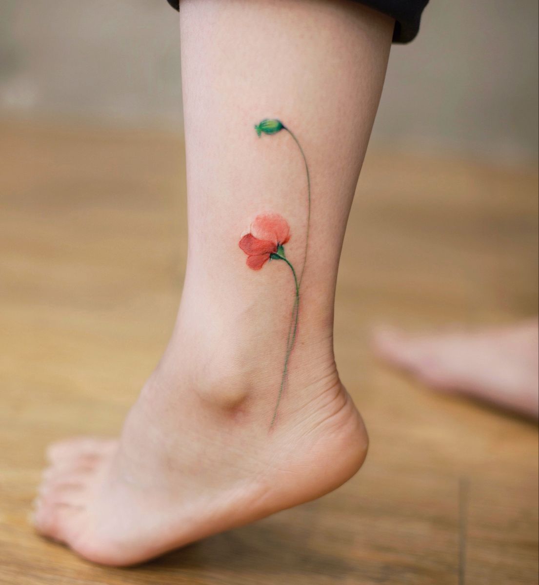 Small delicate poppy tattoo 0017