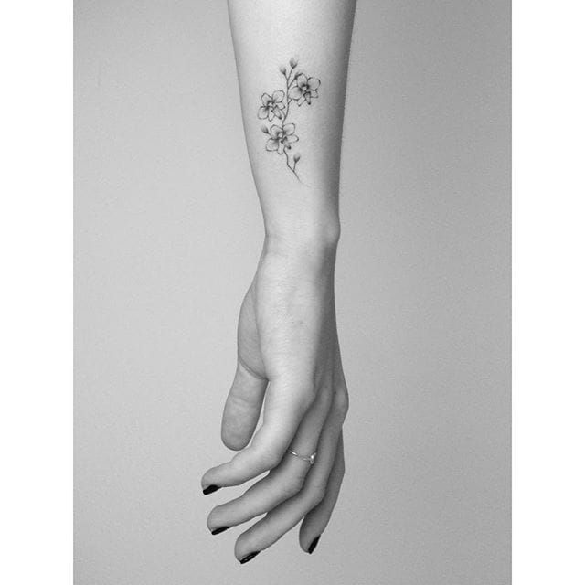 Small delicate poppy tattoo 0087