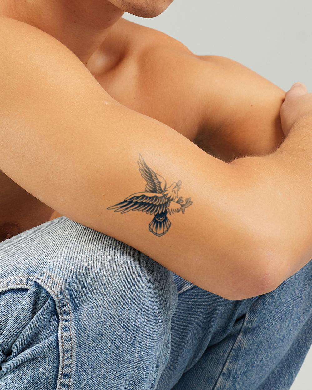 small eagle chest tattoo inspiration