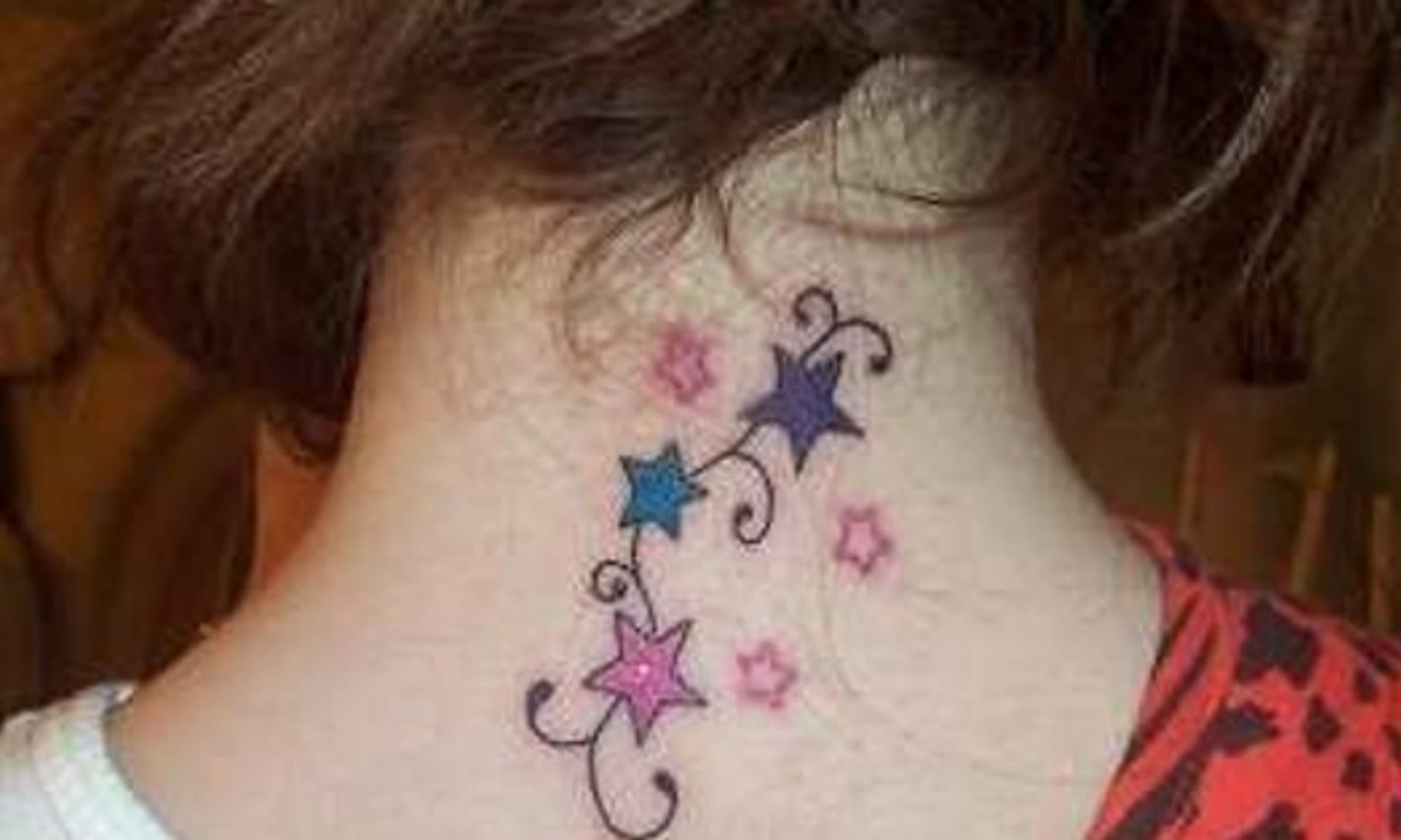 small female front neck tattoo 0043