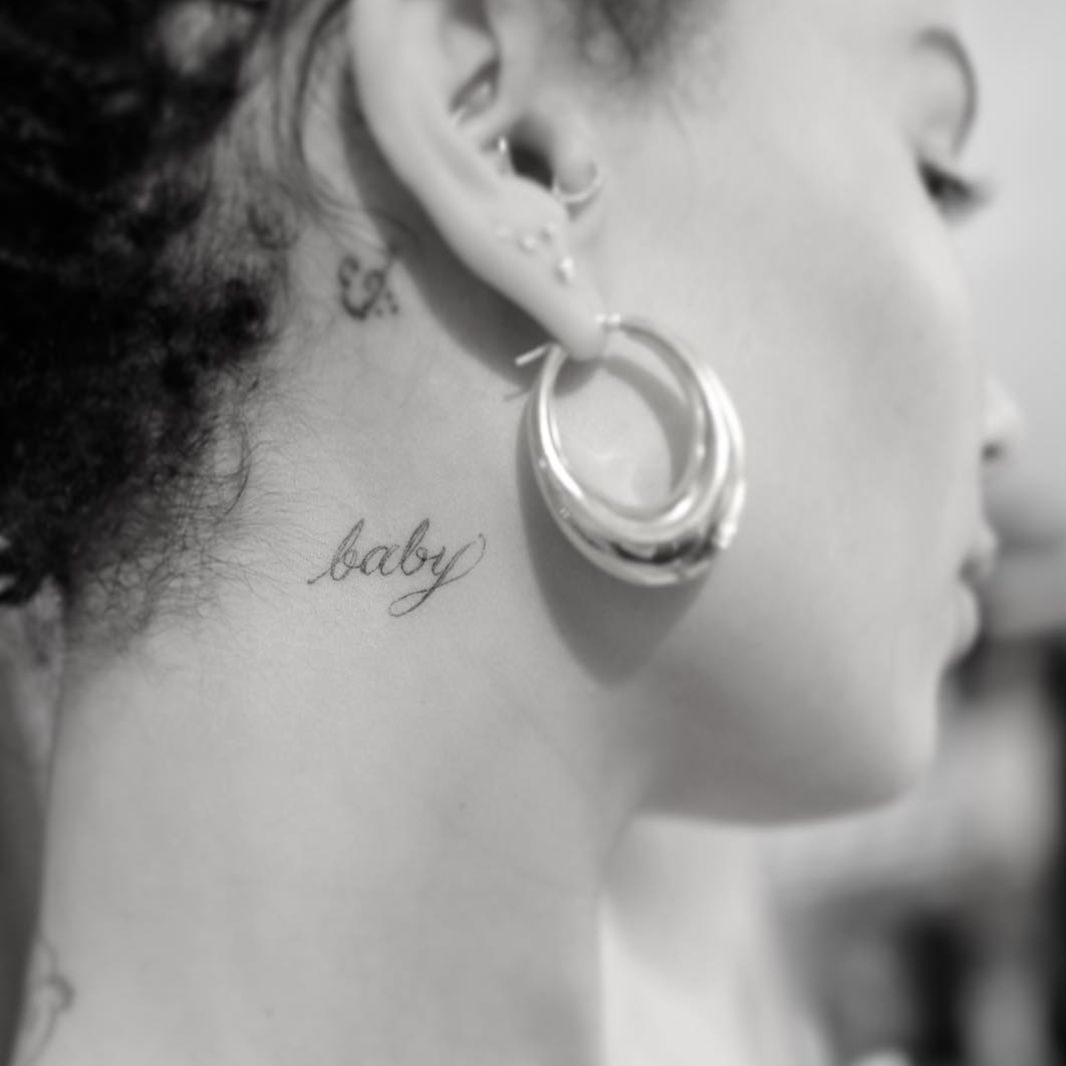 small female front neck tattoo 0055