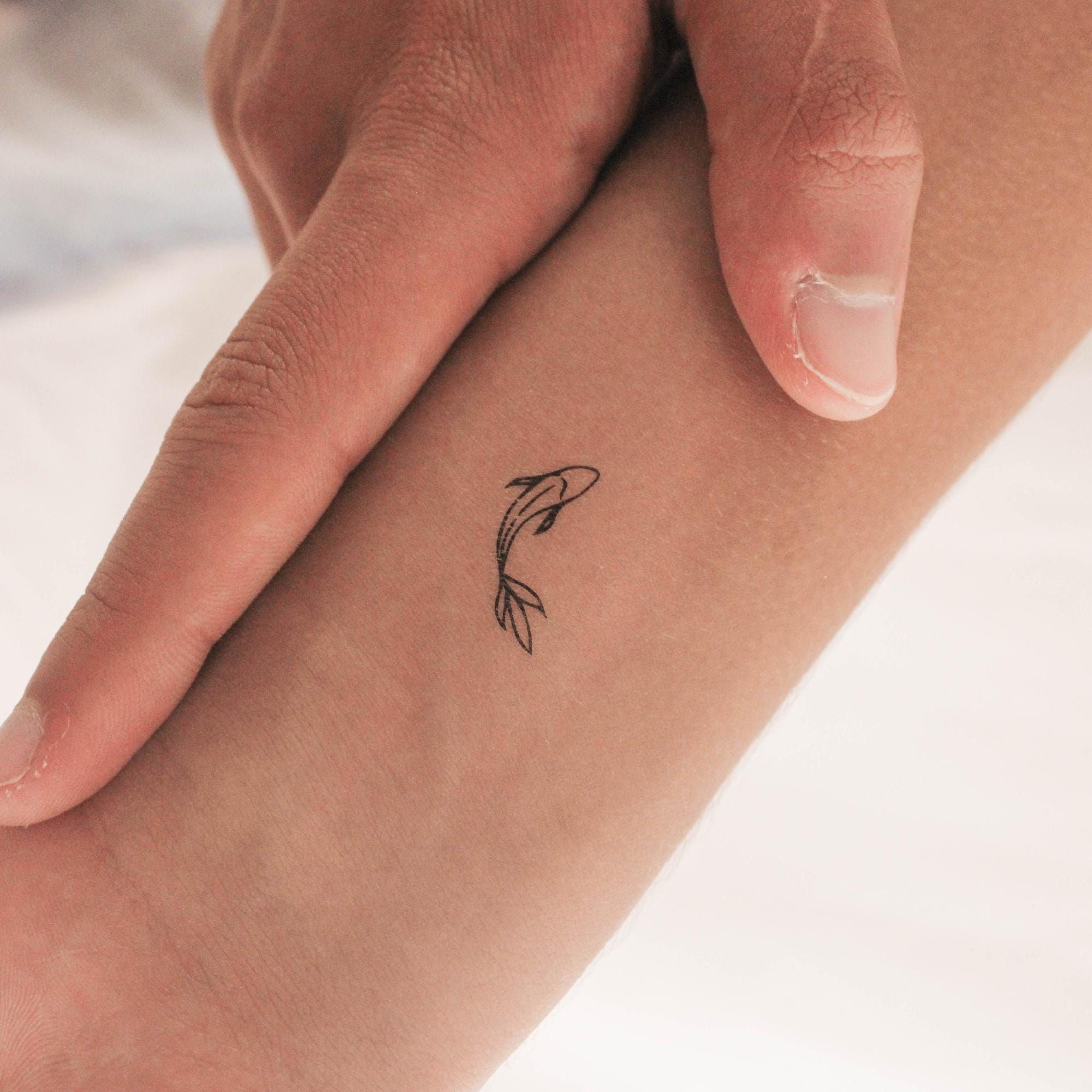 small fish tattoo 0013