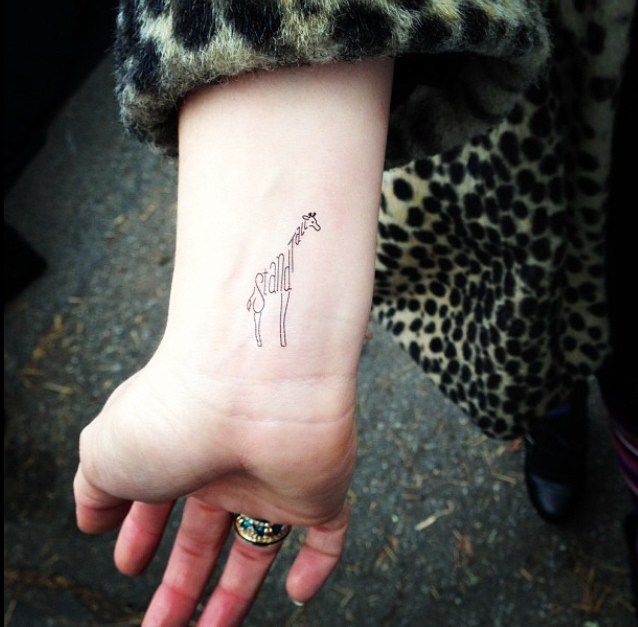 small giraffe tattoo 0067