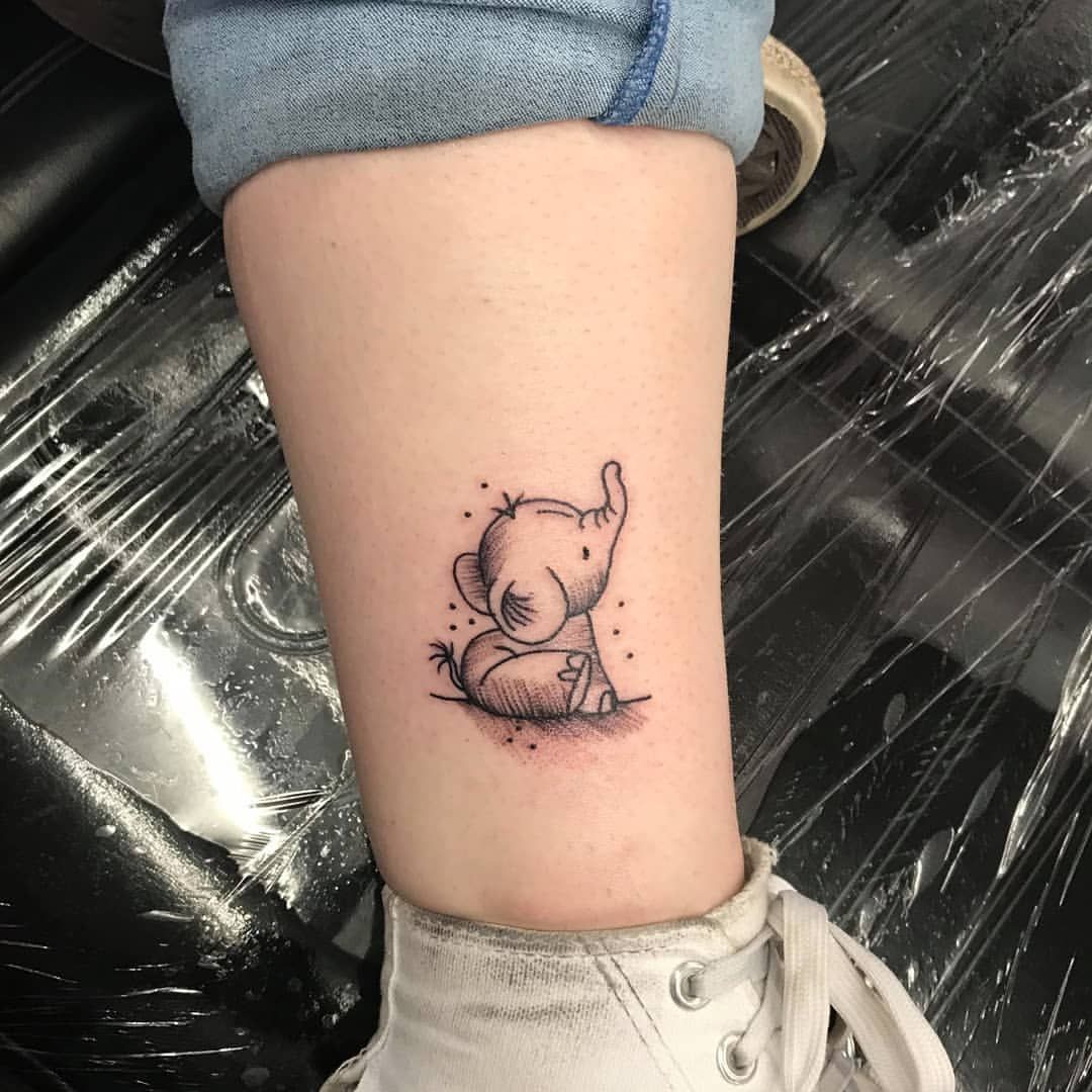 small giraffe tattoo 0089