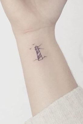 Small lighthouse tattoo 0012