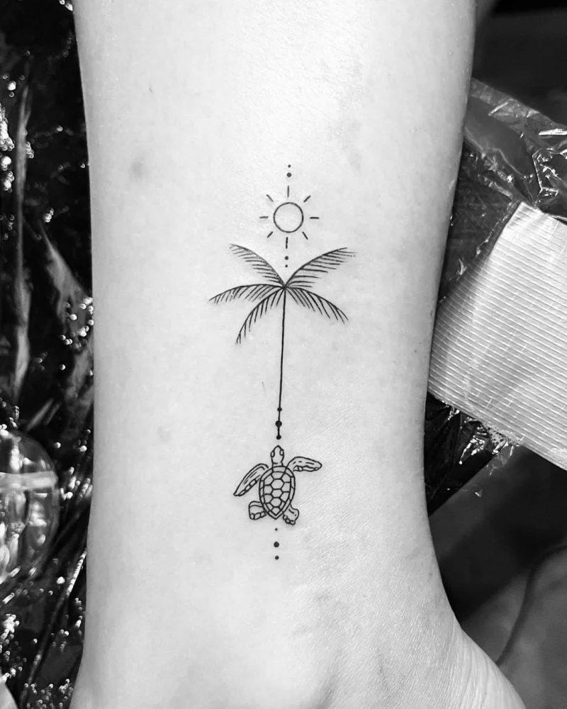 small palm tree tattoo meaning.