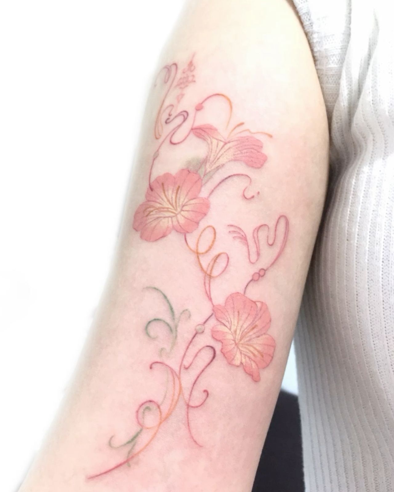 Small pink lotus tattoo 0015