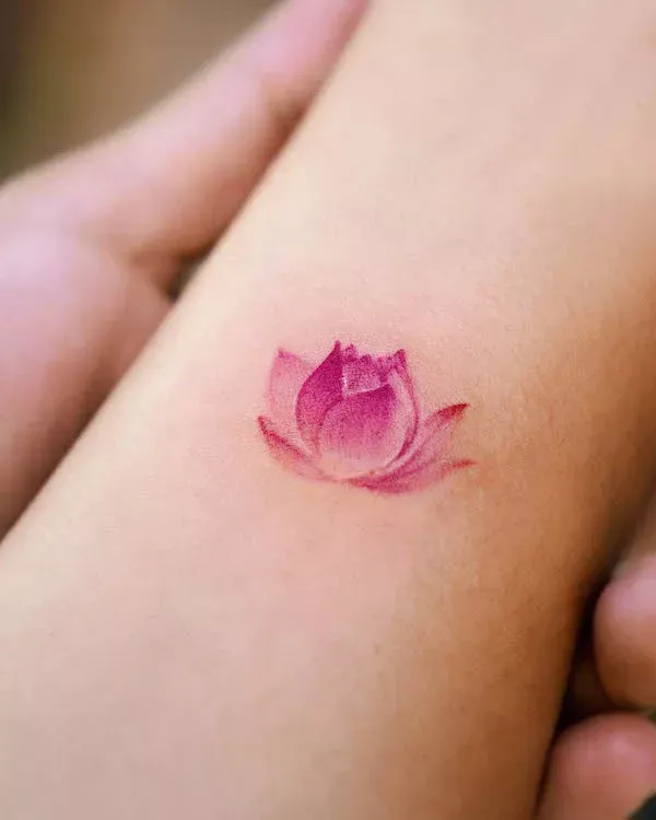 Small pink lotus tattoo 0022