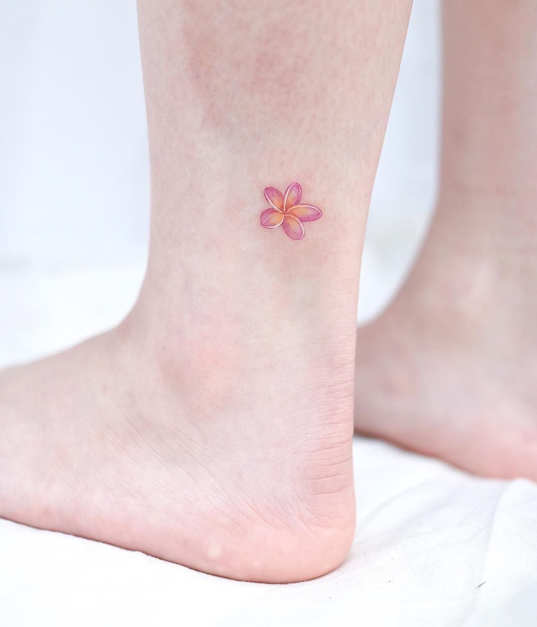 Small plumeria tattoo 0026