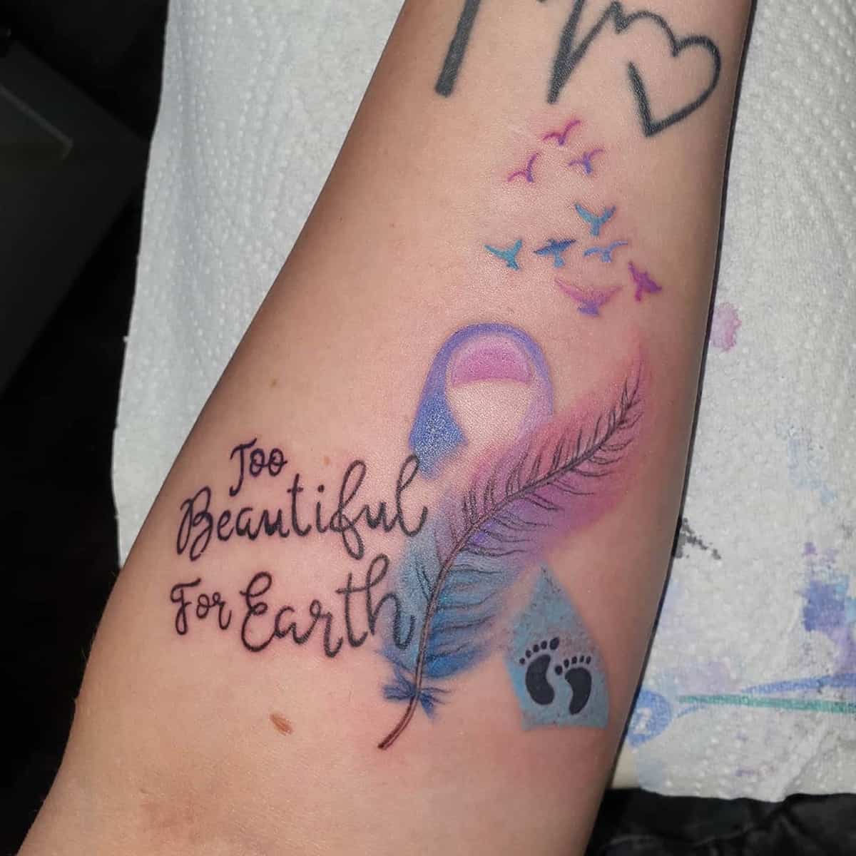 Small pregnancy loss miscarriage tattoo 0012