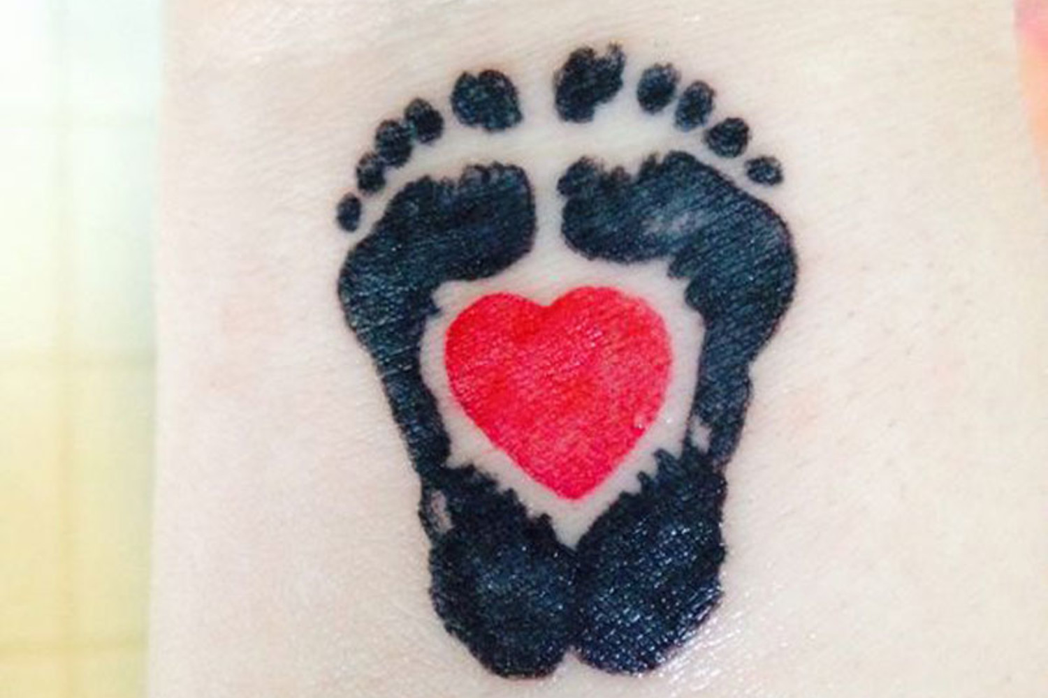 Small pregnancy loss miscarriage tattoo 0085