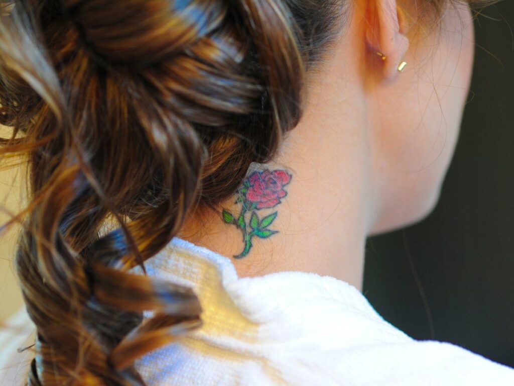 small rose neck tattoo 0079