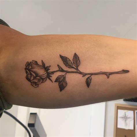 Small rose tattoo