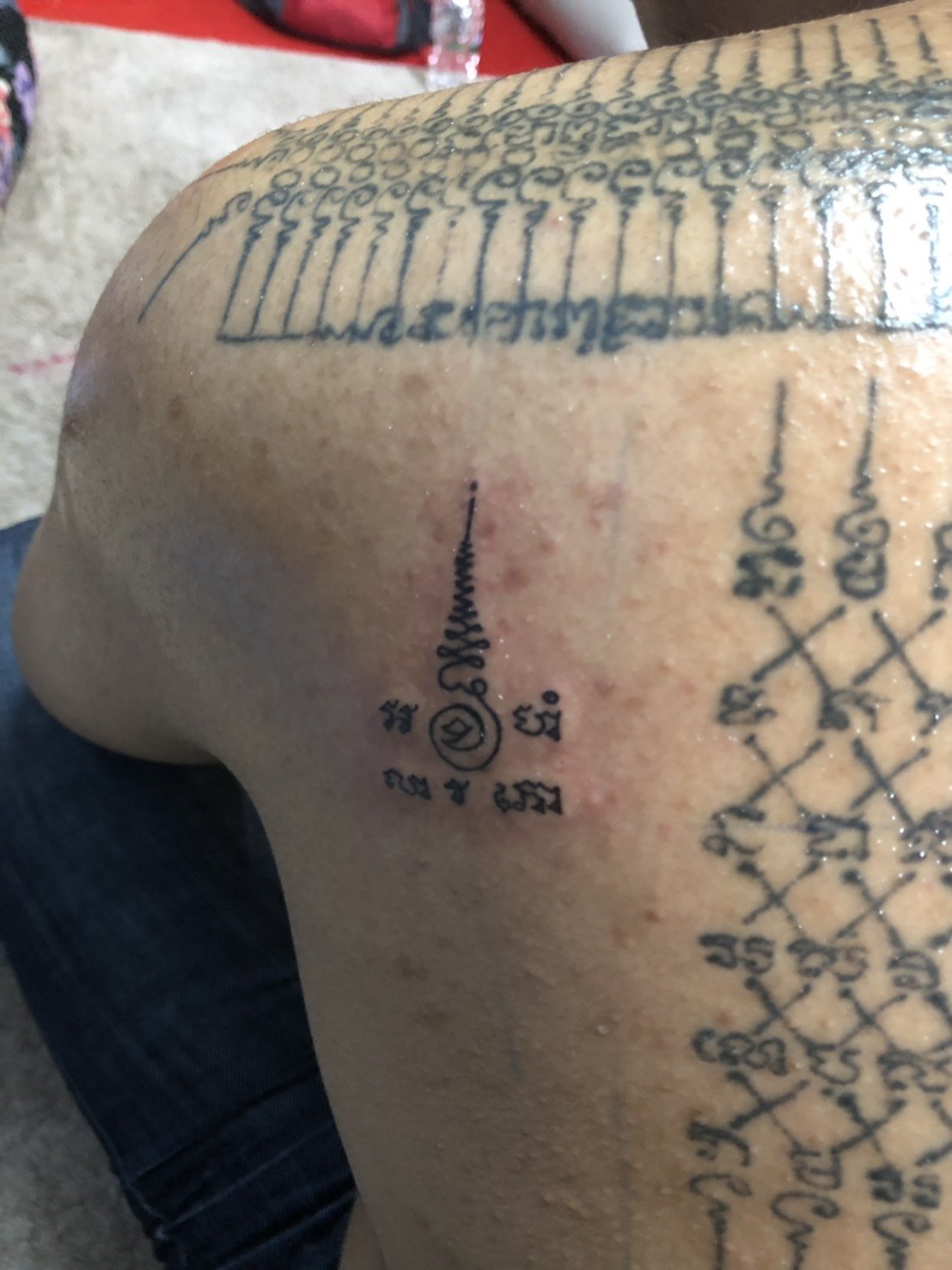 Small sak yant tattoo 0041