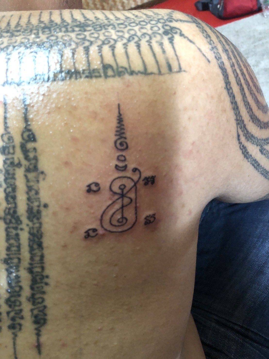 Small sak yant tattoo 0049