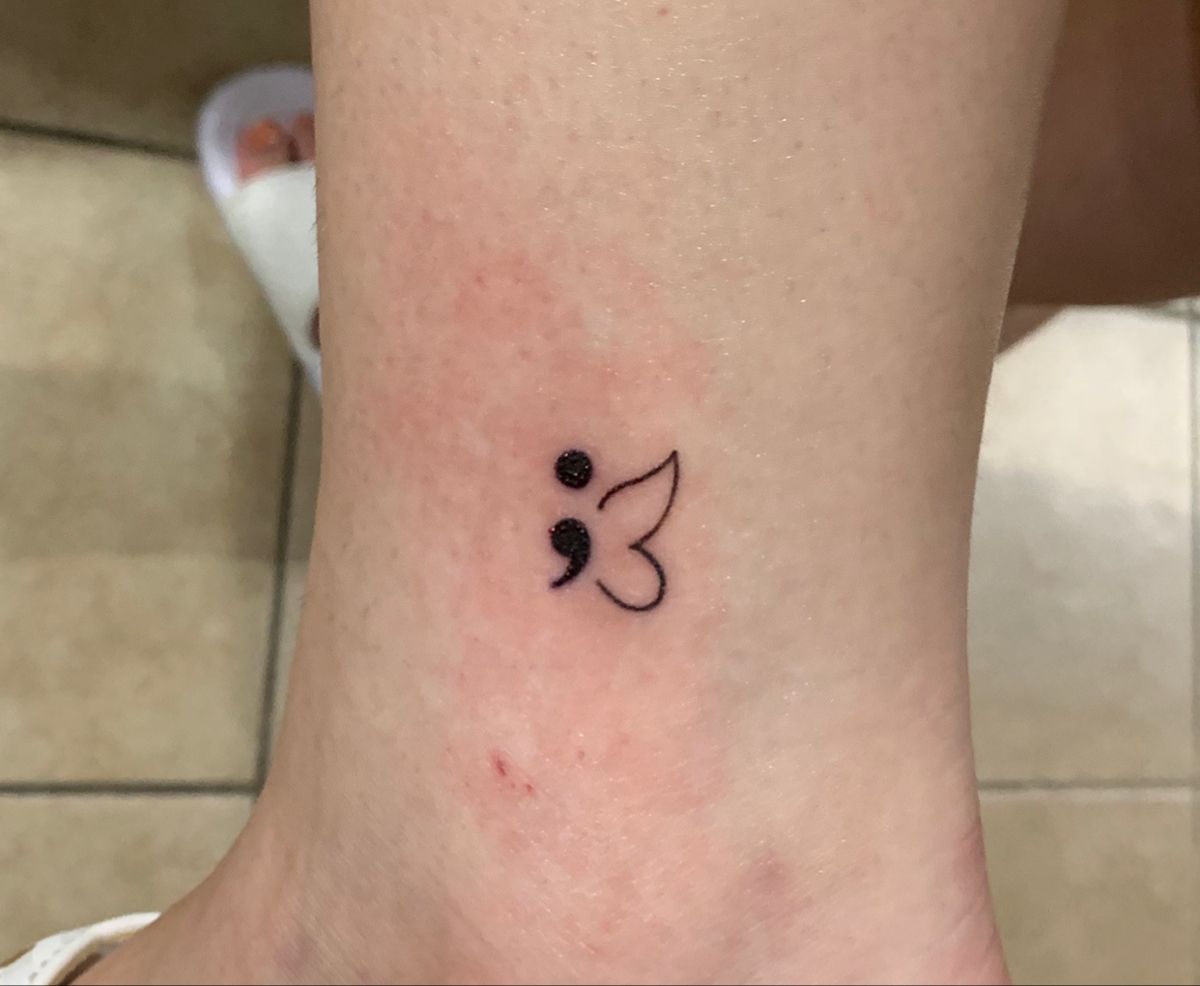 small semicolon butterfly tattoo for women